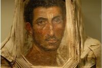 Three ancient-looking Fayum mummy portraits showing two women and a man